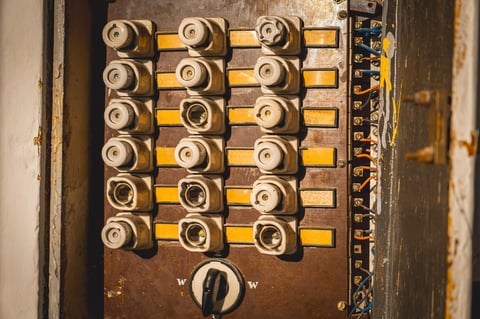 old fuse box. old electrical installation in an electrical cabinet.